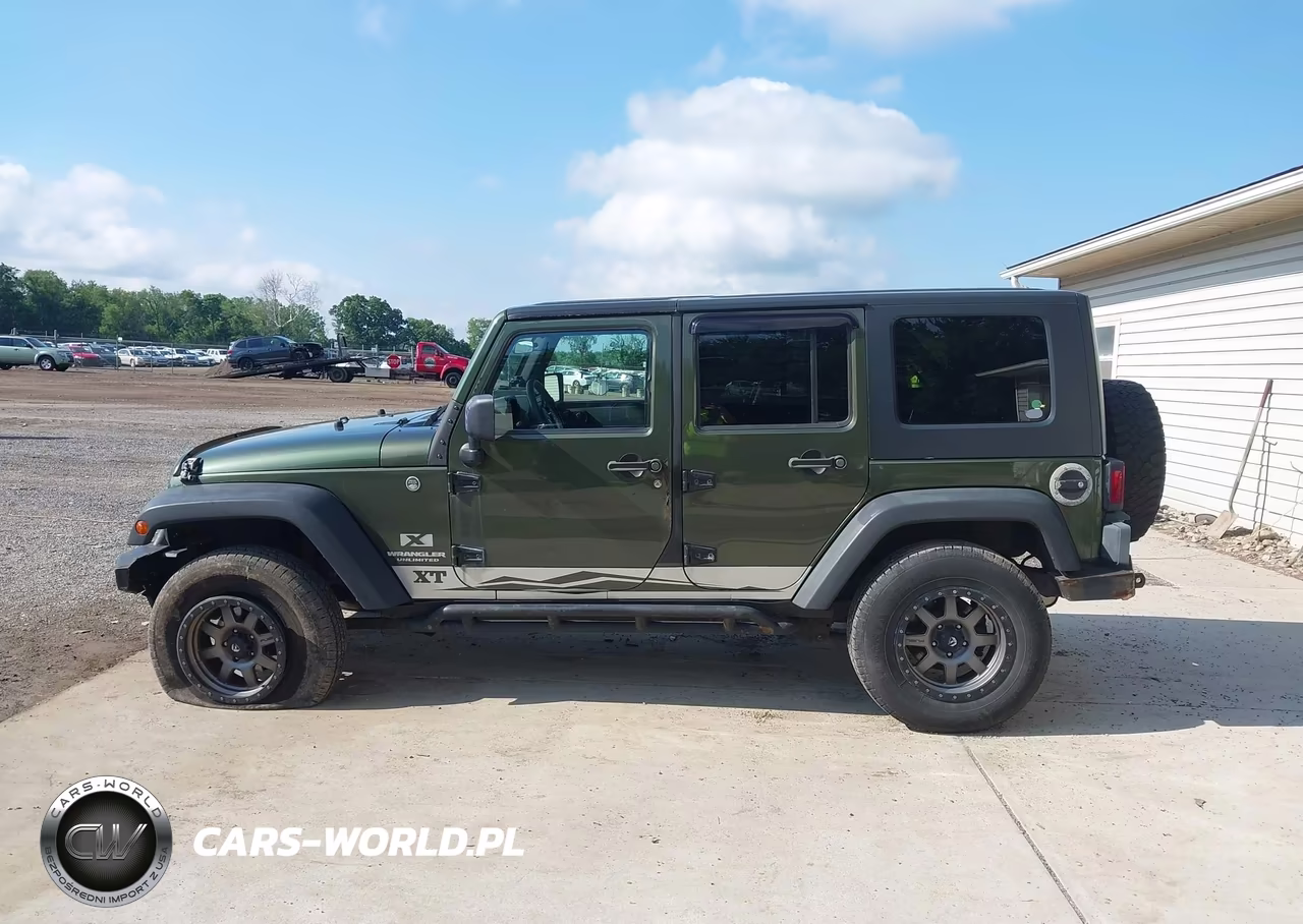 2009 Jeep Wrangler Unlimited X VIN:1J4GA39149L711196 - 14