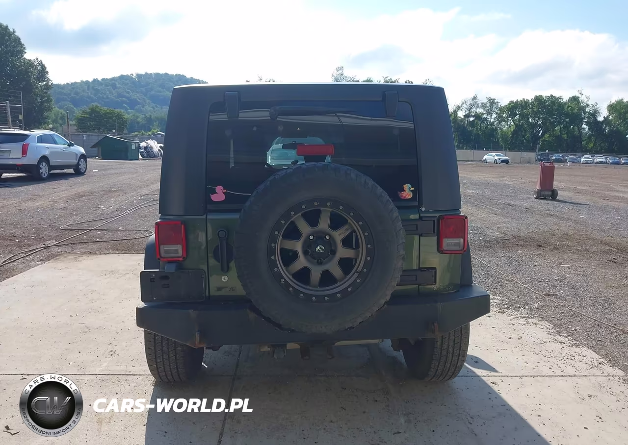 2009 Jeep Wrangler Unlimited X VIN:1J4GA39149L711196 - 16