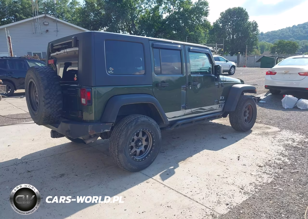 2009 Jeep Wrangler Unlimited X VIN:1J4GA39149L711196 - 4