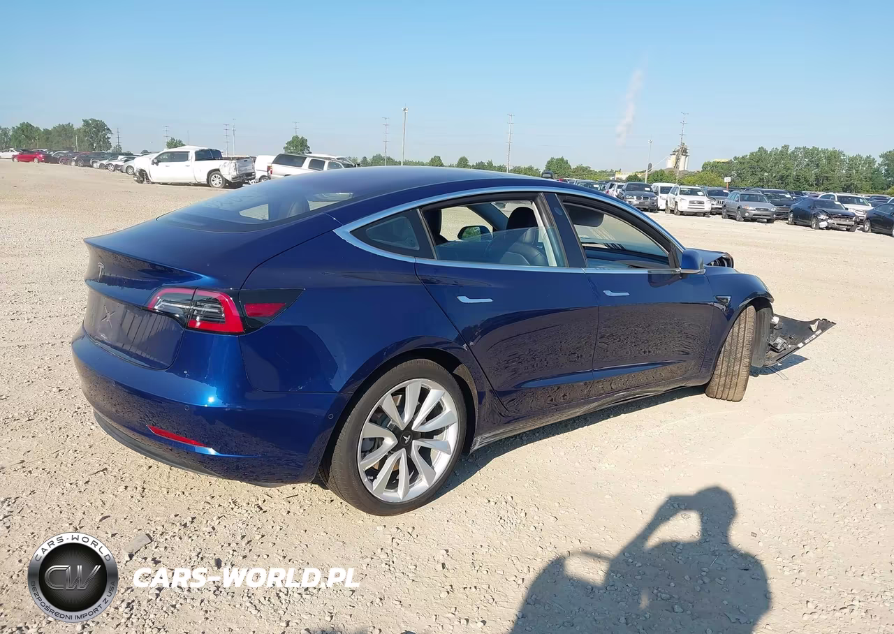 2017 Tesla Model 3 Long Range-Standard VIN:5YJ3E1EA1HF001029 - 4