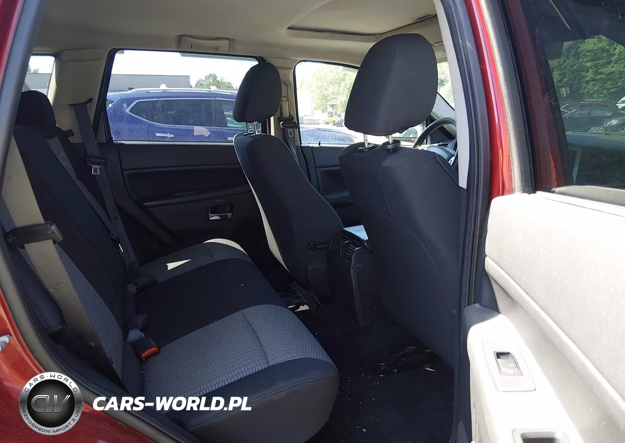 2009 Jeep Grand Cherokee Laredo VIN:1J8GR48KX9C543331 - 8
