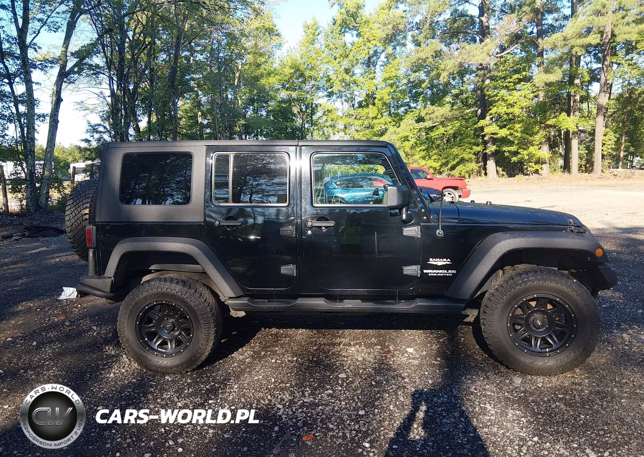 2007 Jeep Wrangler Unlimited Sahara VIN:1J4GA59117L118243 - 13