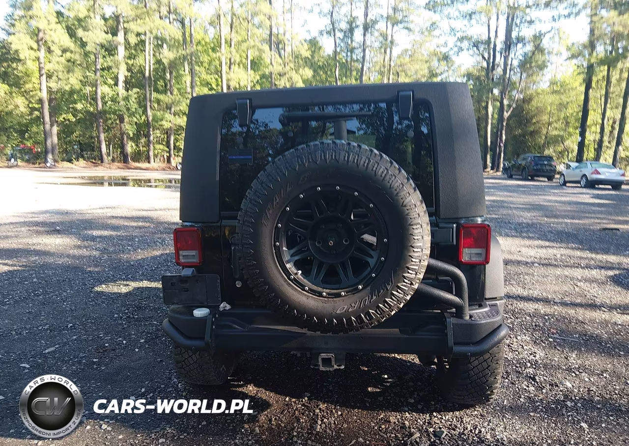 2007 Jeep Wrangler Unlimited Sahara VIN:1J4GA59117L118243 - 16