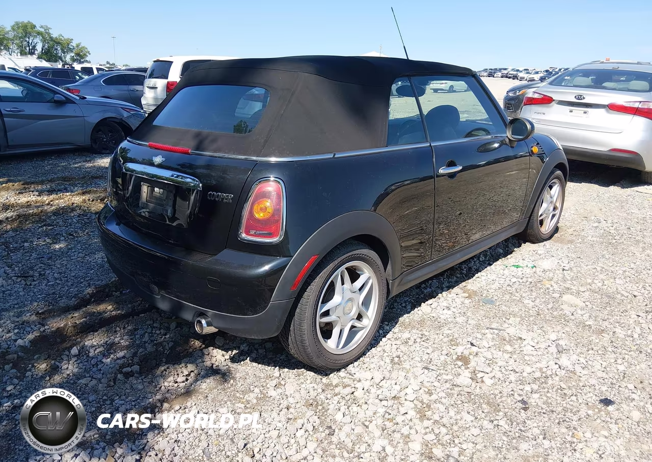 2009 Mini Cooper VIN:WMWMR33519TU95219 - 4