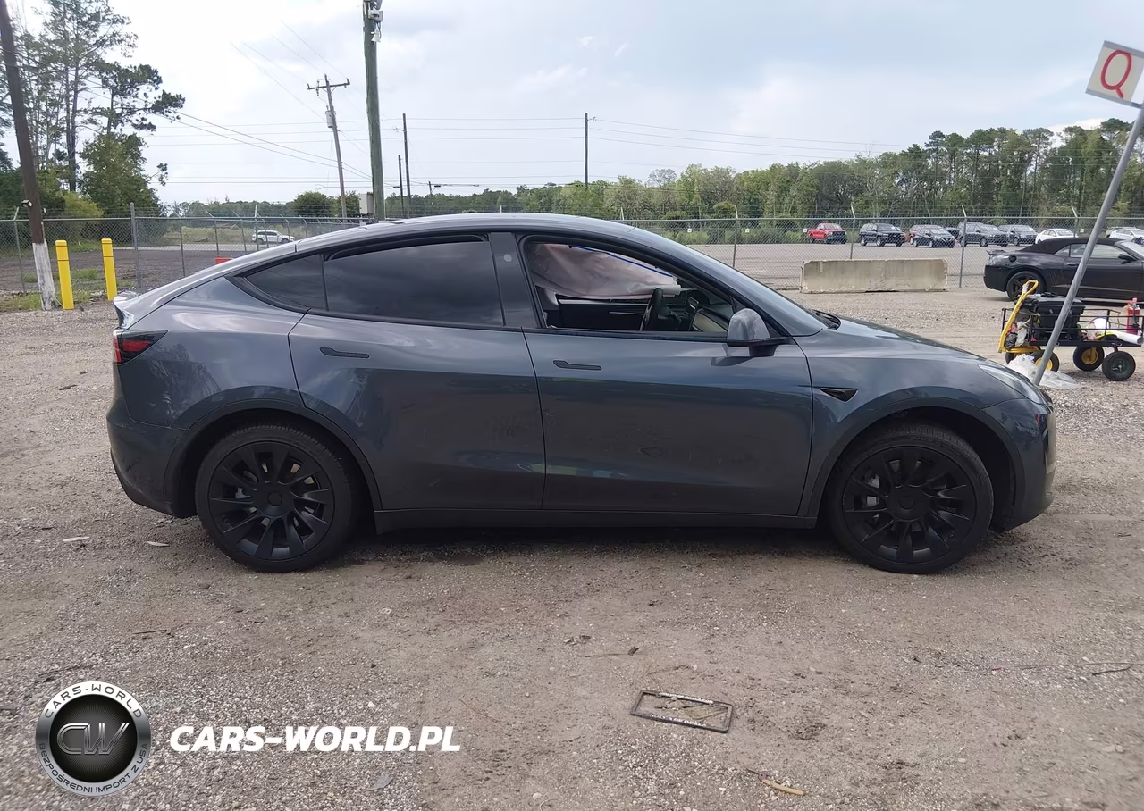 2023 Tesla Model Y Rwd VIN:7SAYGDED5PF945977 - 13