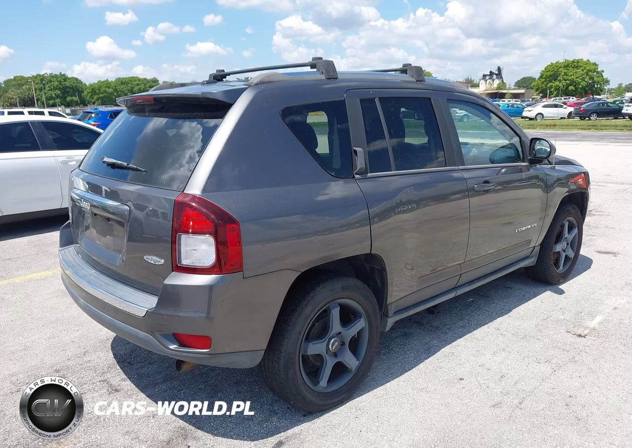 2014 Jeep Compass High Altitude VIN:1C4NJCEA4ED814691 - 4