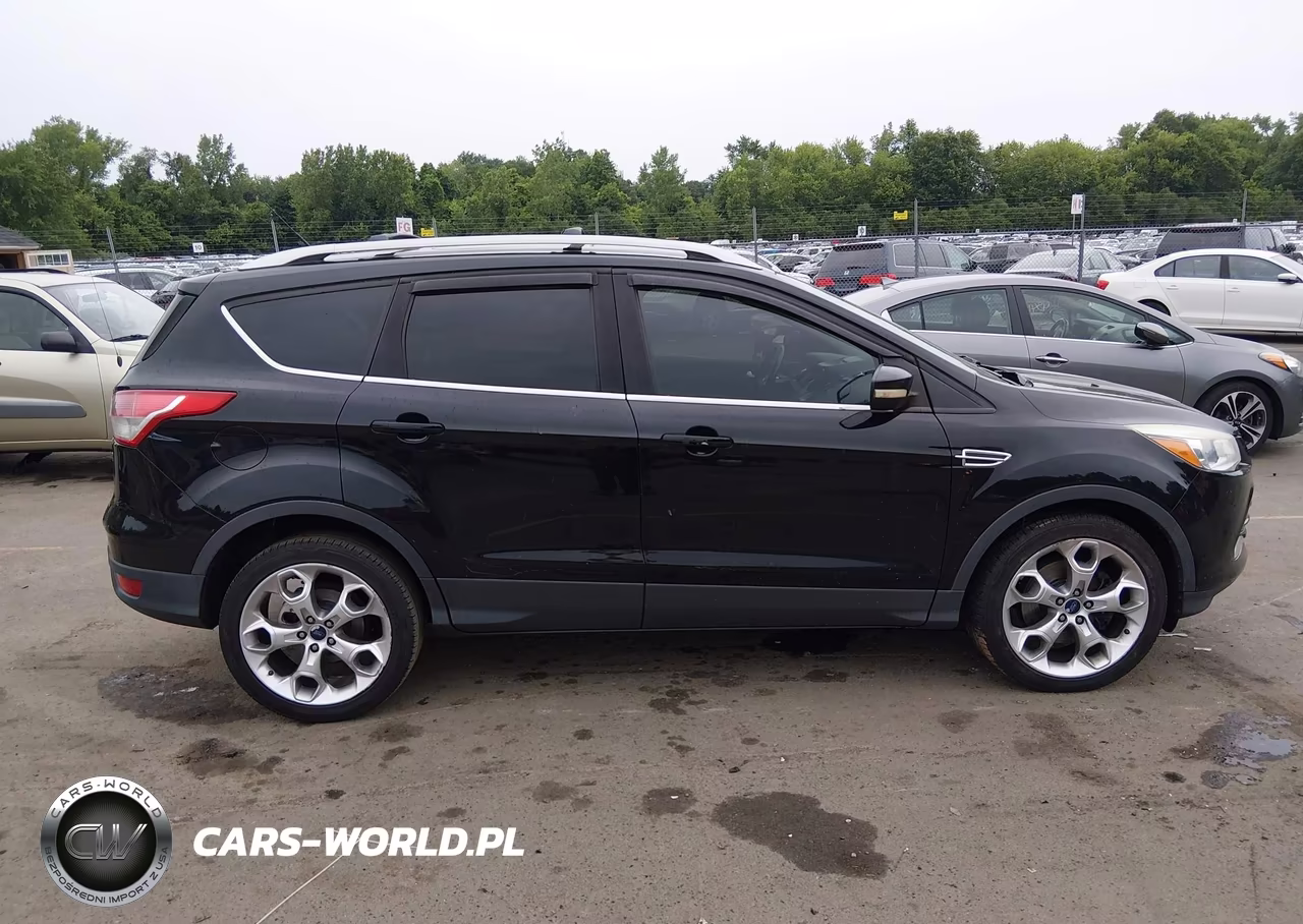 2016 Ford Escape Titanium VIN:1FMCU9J9XGUB49713 - 13