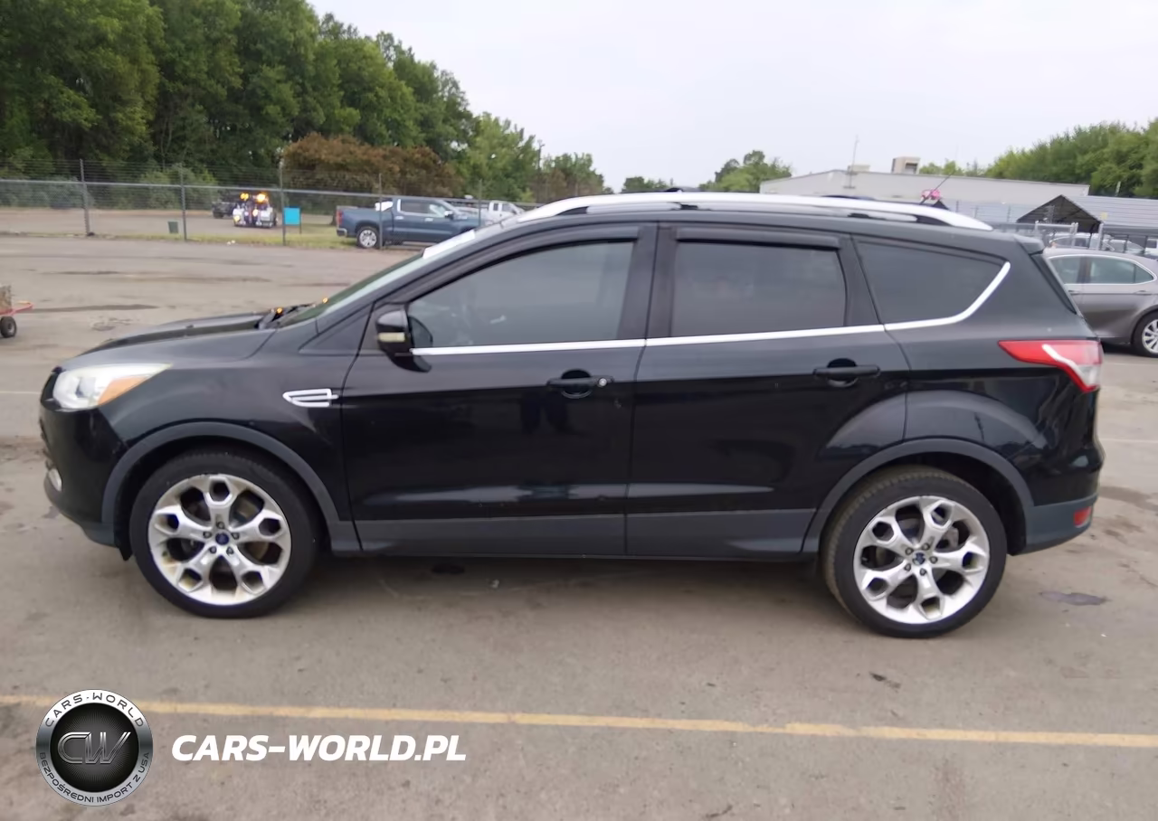 2016 Ford Escape Titanium VIN:1FMCU9J9XGUB49713 - 14