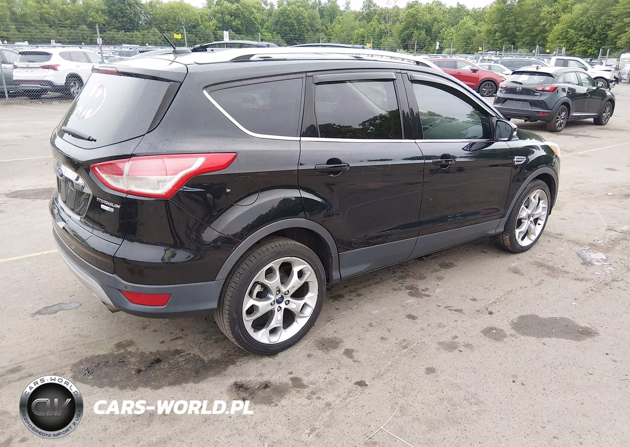2016 Ford Escape Titanium VIN:1FMCU9J9XGUB49713 - 4