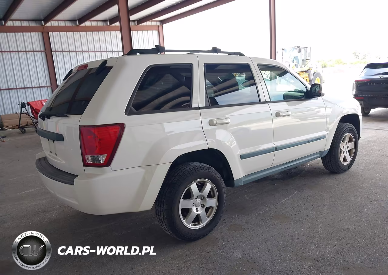 2009 Jeep Grand Cherokee Laredo VIN:1J8GR48K69C539440 - 4