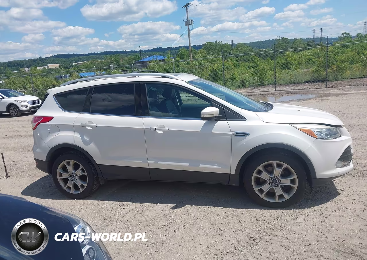 2016 Ford Escape Titanium VIN:1FMCU9J99GUA94249 - 13