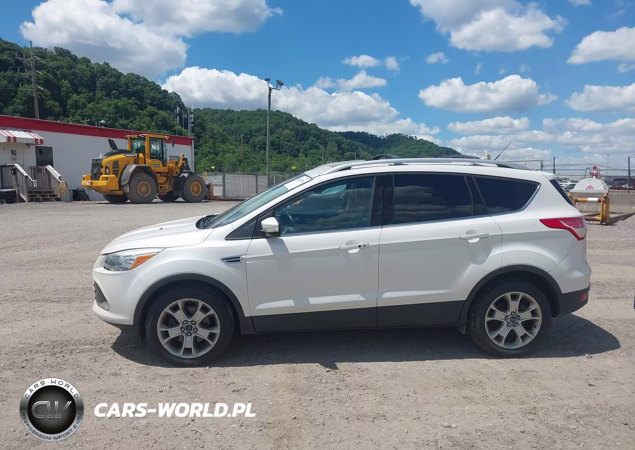 2016 Ford Escape Titanium VIN:1FMCU9J99GUA94249 - 14