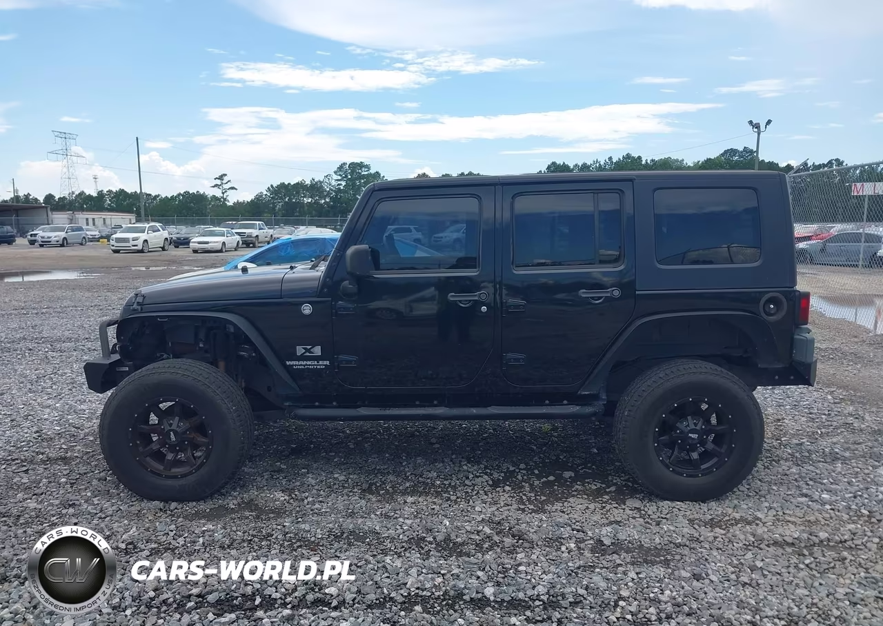 2009 Jeep Wrangler Unlimited X VIN:1J4GA39139L772166 - 14