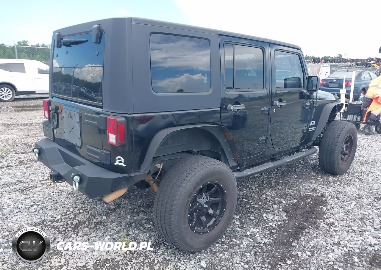 2009 Jeep Wrangler Unlimited X VIN:1J4GA39139L772166 - 4