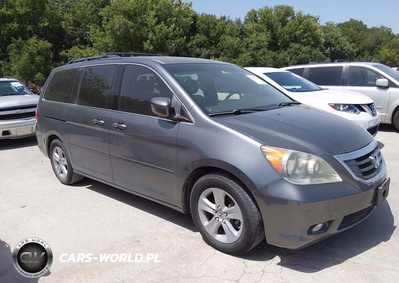 2010 Honda Odyssey Touring VIN:5FNRL3H93AB018899 - 13