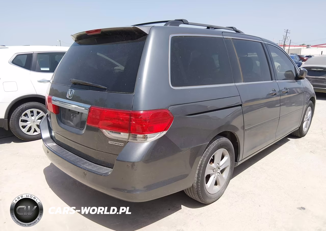 2010 Honda Odyssey Touring VIN:5FNRL3H93AB018899 - 4