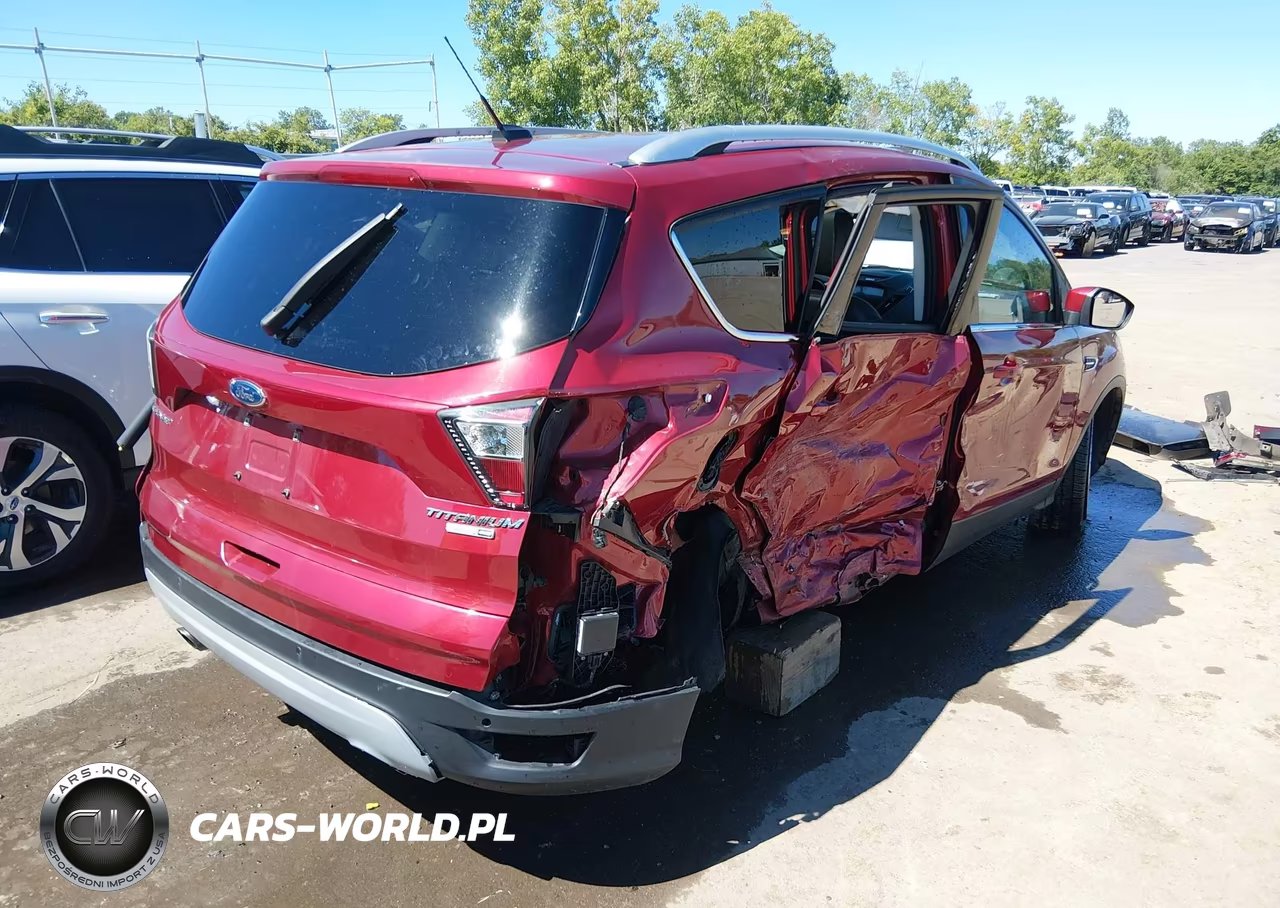 2017 Ford Escape Titanium VIN:1FMCU9J98HUA49479 - 4
