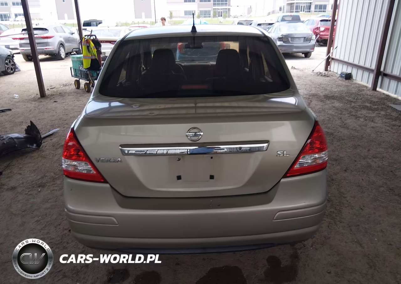 2009 Nissan Versa 1.8Sl VIN:3N1BC11E39L476231 - 16