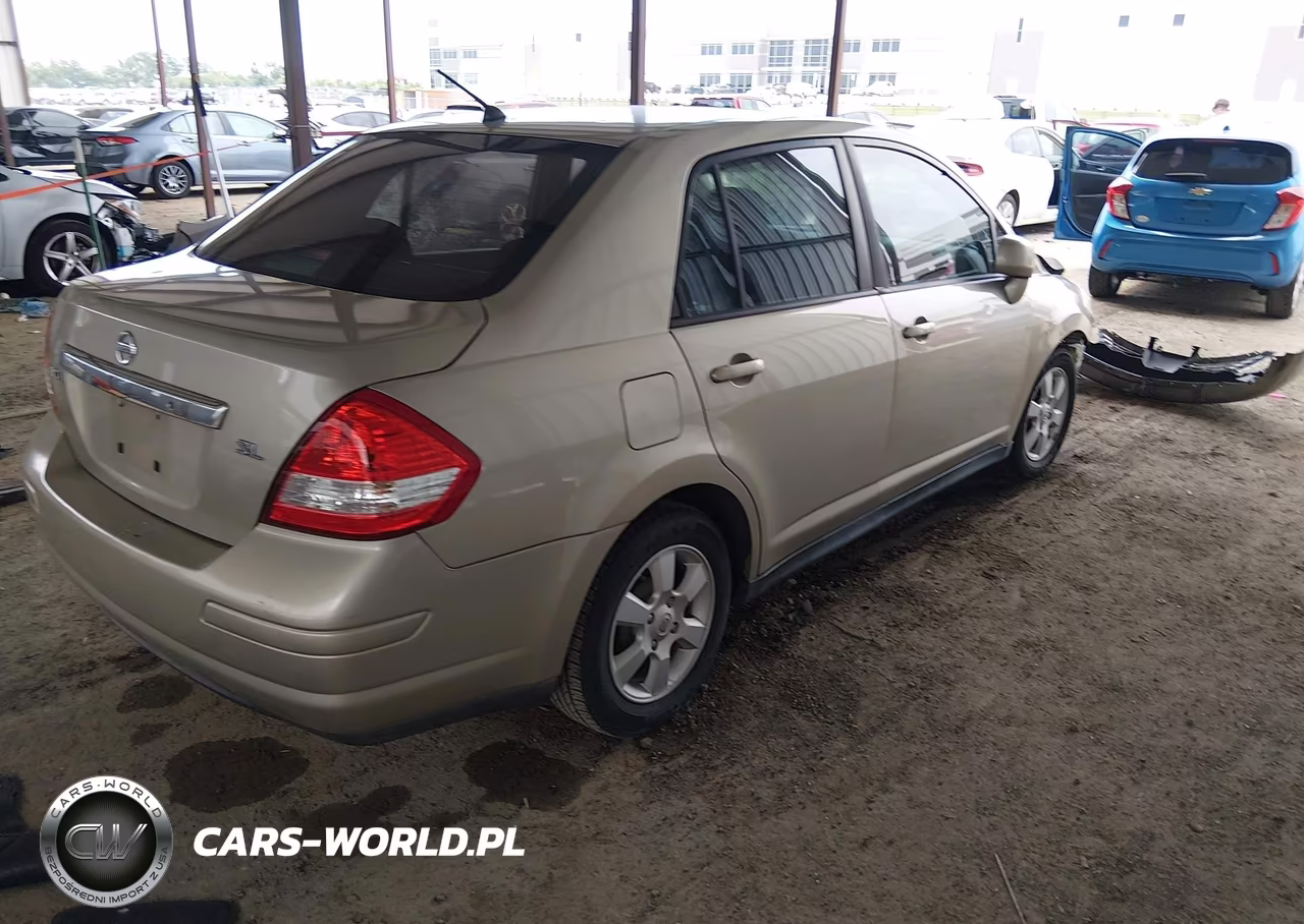 2009 Nissan Versa 1.8Sl VIN:3N1BC11E39L476231 - 4