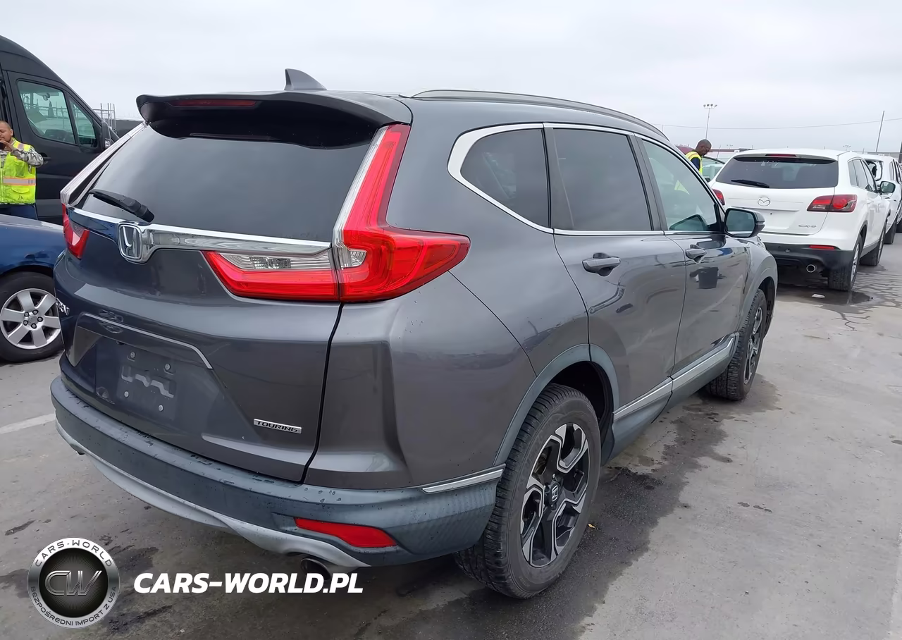 2017 Honda Cr-V Touring VIN:2HKRW1H9XHH509025 - 4