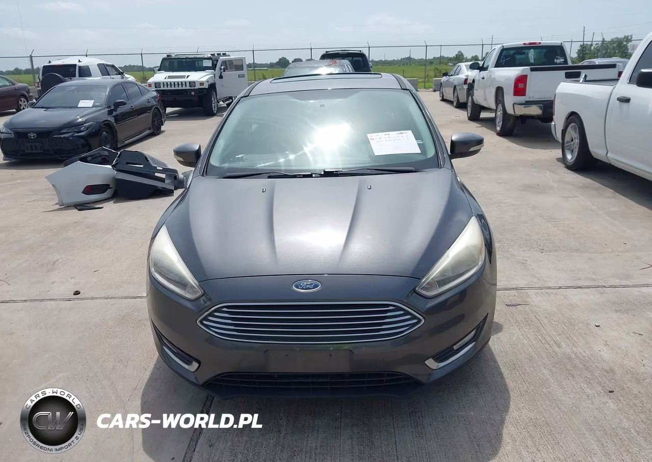 2015 Ford Focus Titanium VIN:1FADP3N29FL387265 - 12