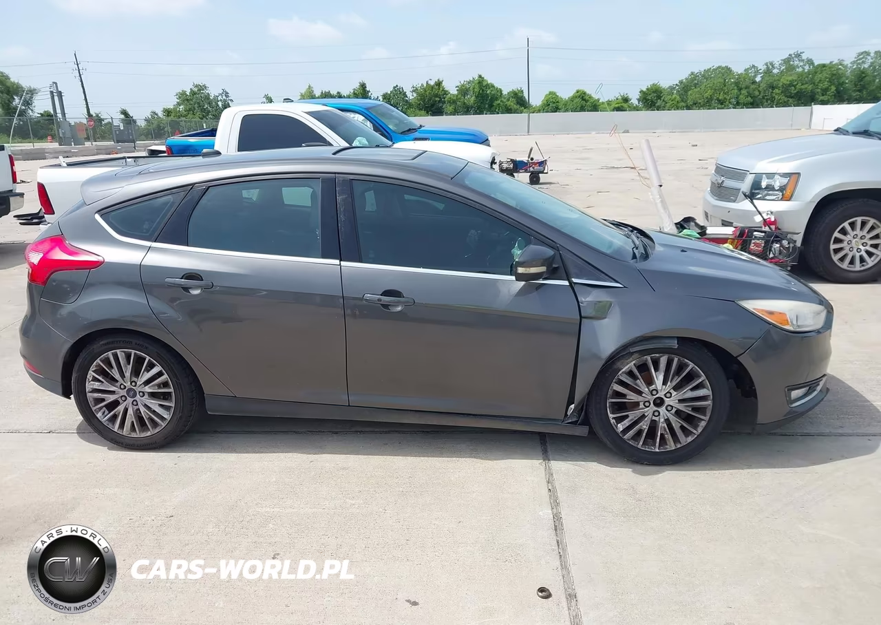 2015 Ford Focus Titanium VIN:1FADP3N29FL387265 - 13