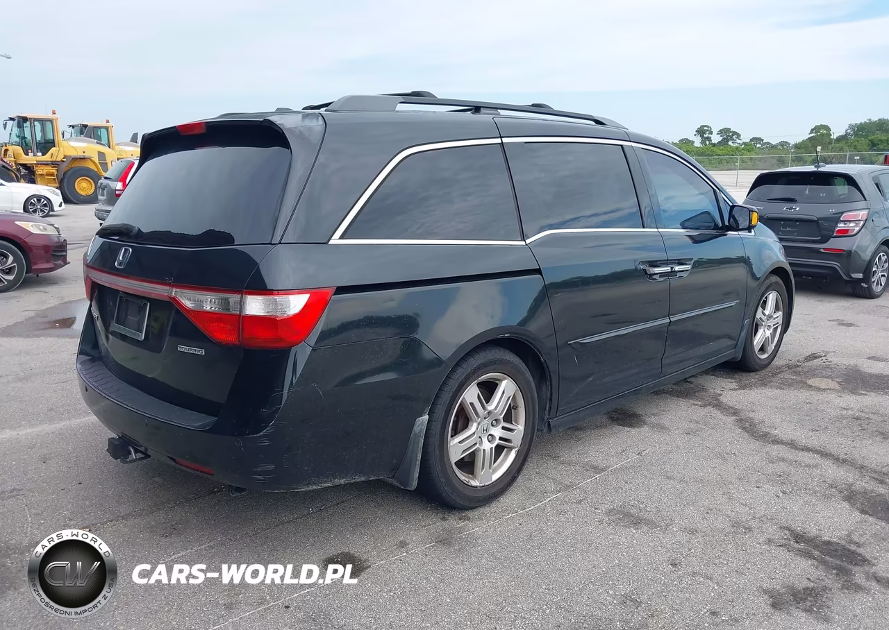2011 Honda Odyssey Touring-Touring Elite VIN:5FNRL5H97BB059971 - 4