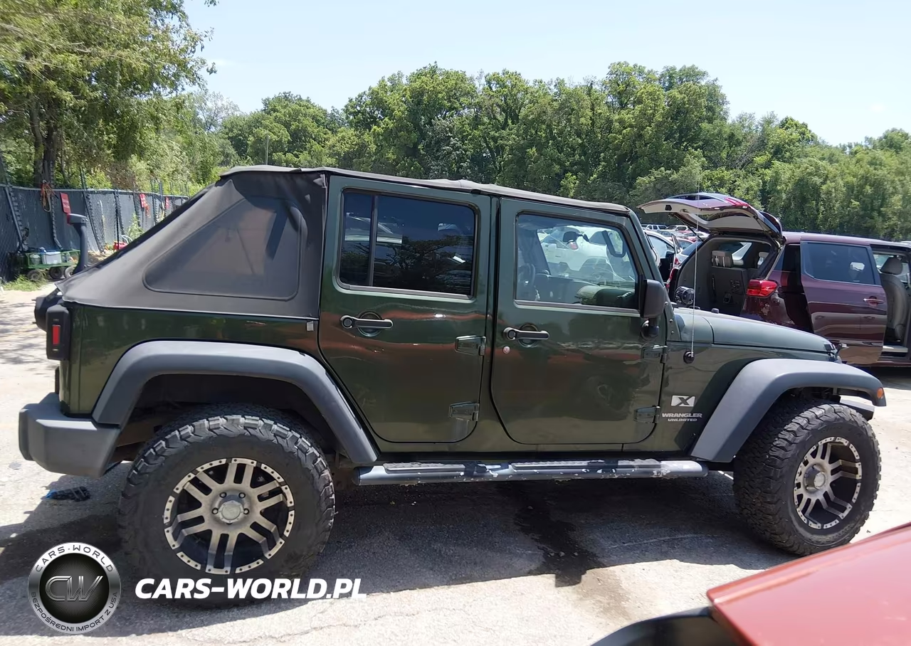 2007 Jeep Wrangler Unlimited X VIN:1J4GA39147L154805 - 14