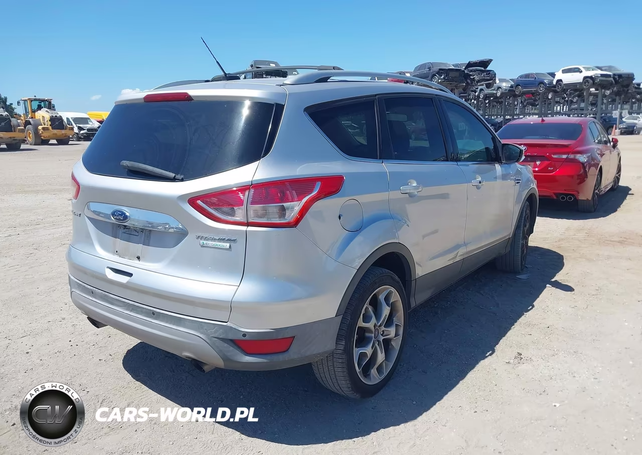 2016 Ford Escape Titanium VIN:1FMCU0J98GUA91743 - 4