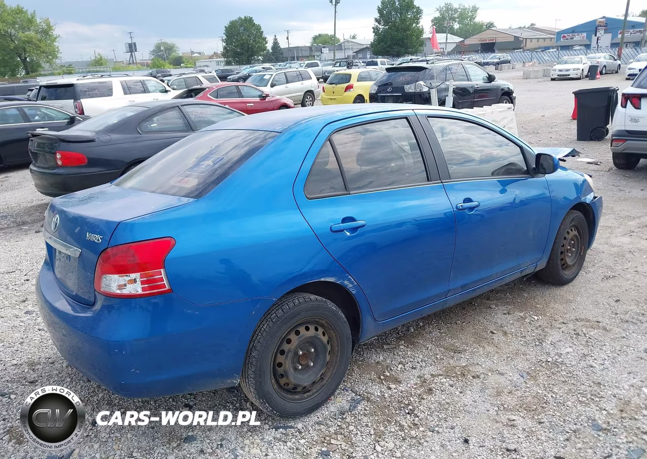 2010 Toyota Yaris VIN:JTDBT4K31A1355558 - 4
