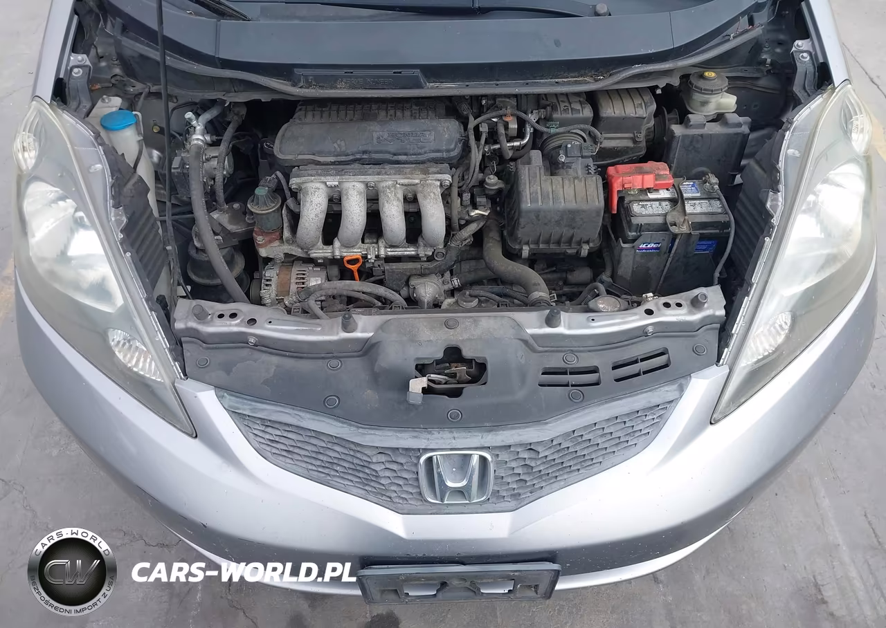 2009 Honda Fit VIN:JHMGE88279C002052 - 10