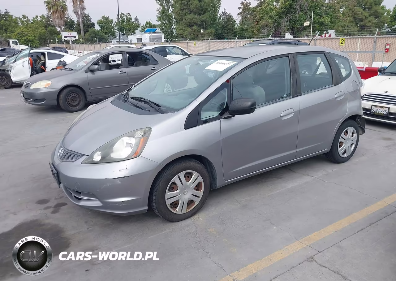 2009 Honda Fit VIN:JHMGE88279C002052 - 2