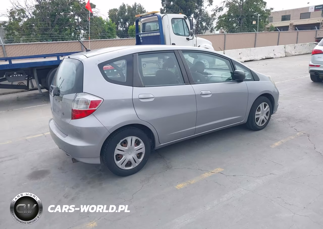 2009 Honda Fit VIN:JHMGE88279C002052 - 4