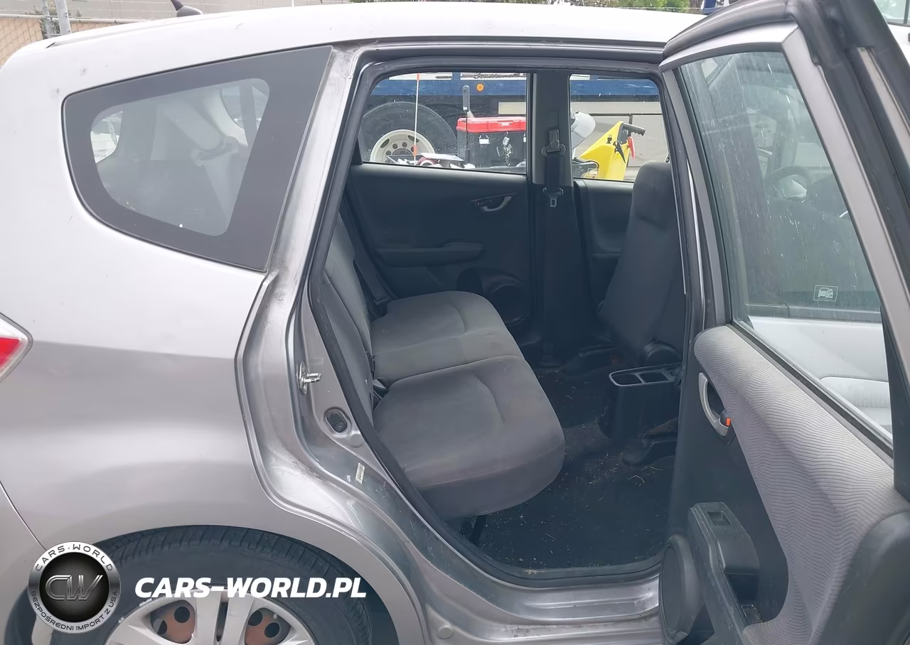 2009 Honda Fit VIN:JHMGE88279C002052 - 8
