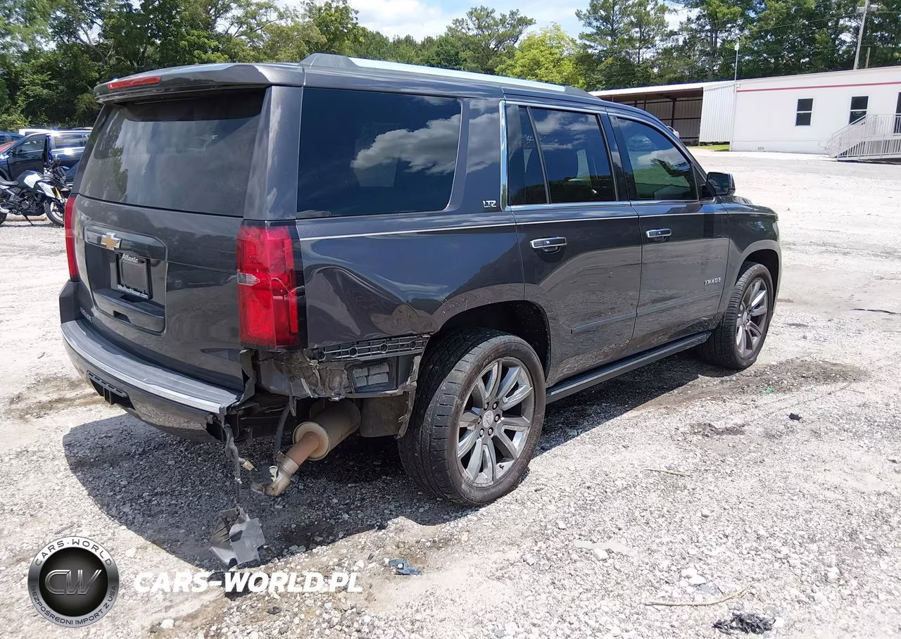 2015 Chevrolet Tahoe Ltz VIN:1GNSKCKC4FR306545 - 4