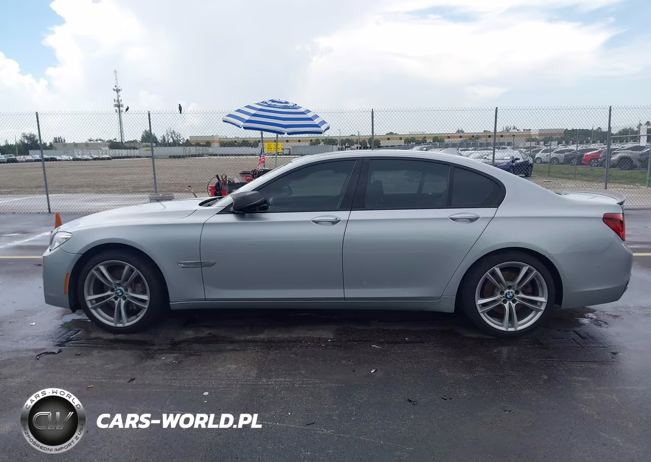 2015 BMW 740I VIN:WBAYA6C5XFD826928 - 14