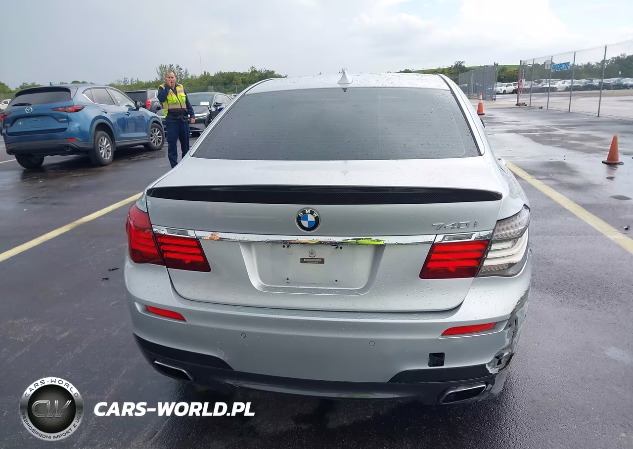 2015 BMW 740I VIN:WBAYA6C5XFD826928 - 16