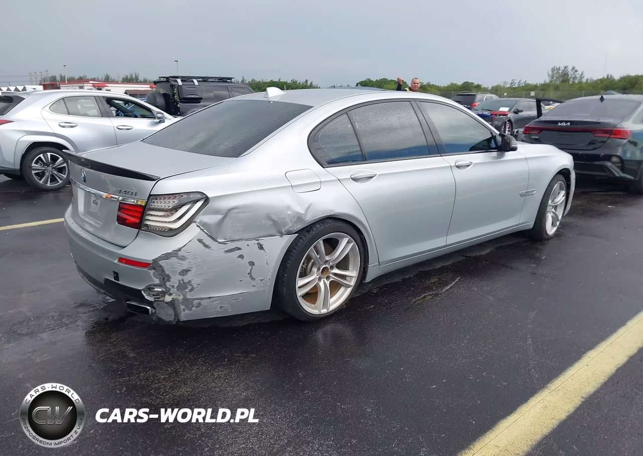 2015 BMW 740I VIN:WBAYA6C5XFD826928 - 4