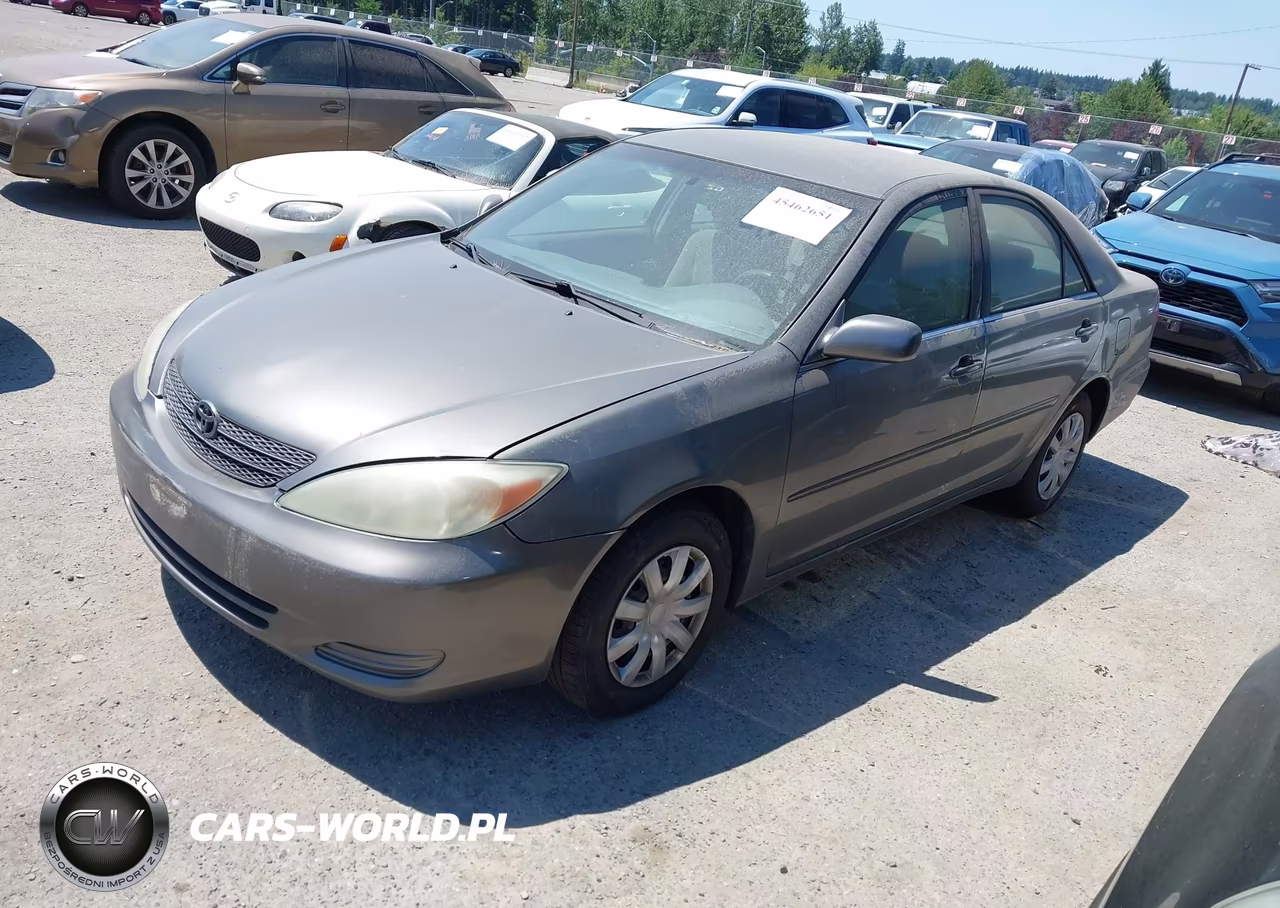 2002 Toyota Camry Le VIN:JTDBE32K720060824 - 2