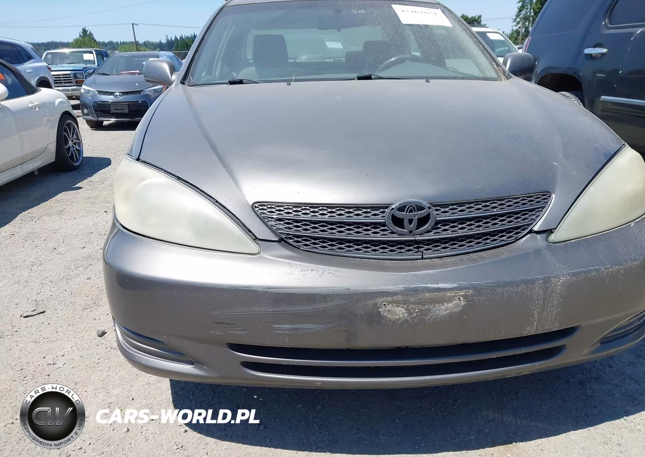 2002 Toyota Camry Le VIN:JTDBE32K720060824 - 6