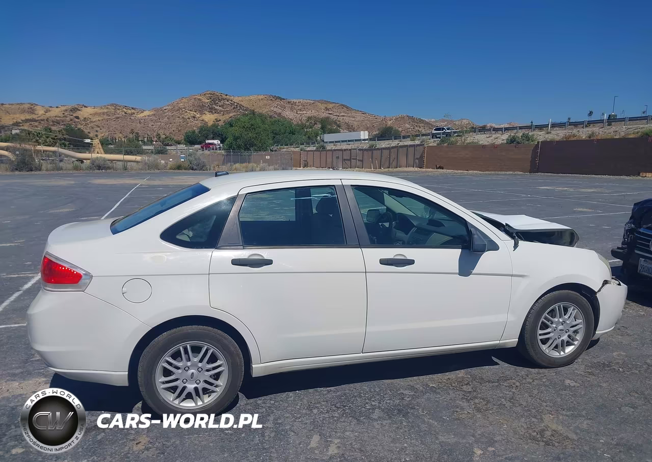 2009 Ford Focus Se VIN:1FAHP35N39W124753 - 12
