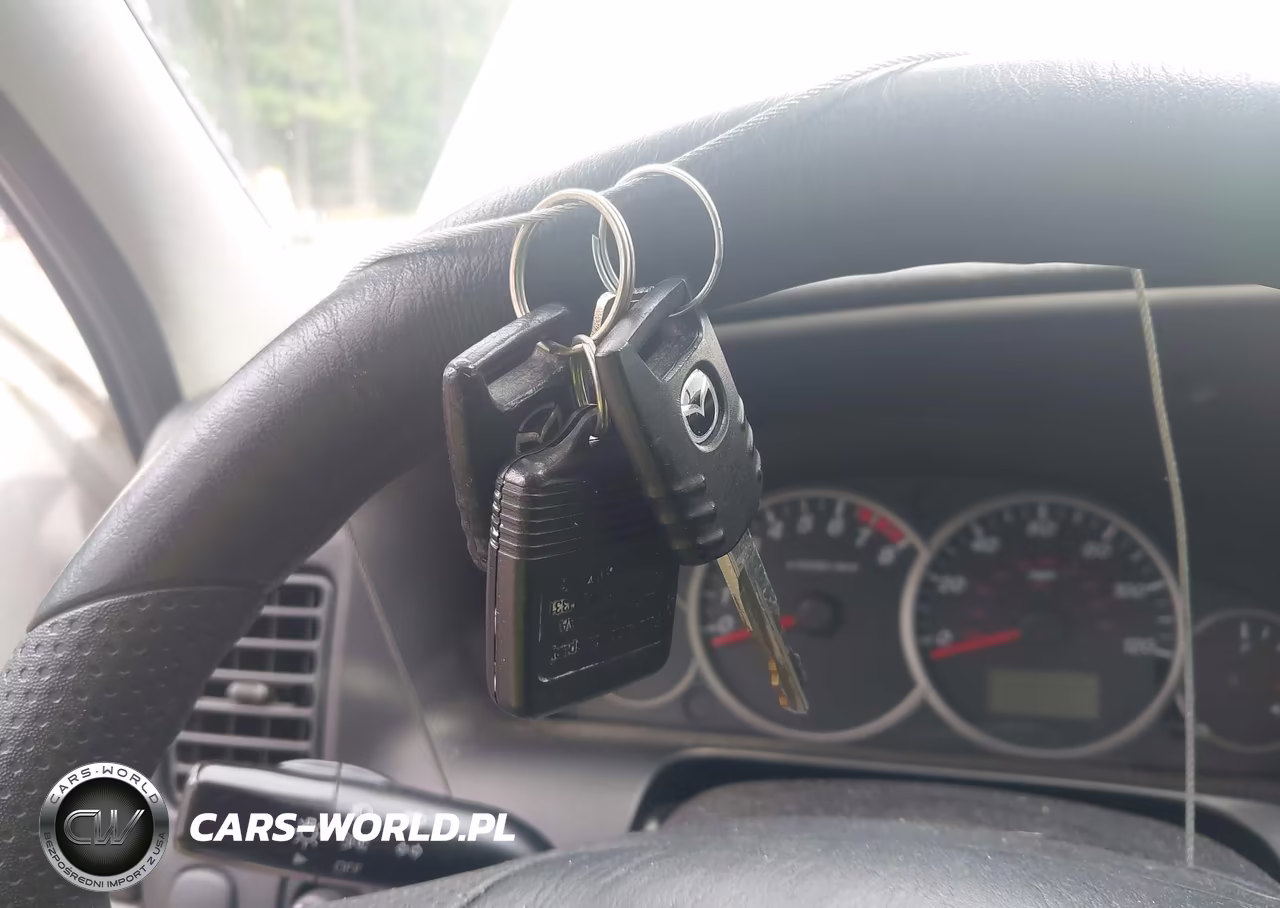 2006 Mazda Tribute S VIN:4F2YZ04126KM20125 - 11