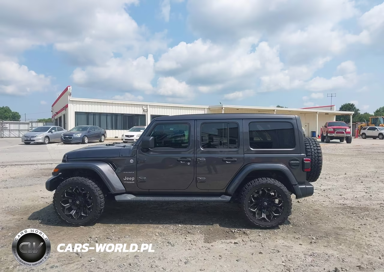 2020 Jeep Wrangler Unlimited Sahara 4X4 VIN:1C4HJXEGXLW119657 - 14