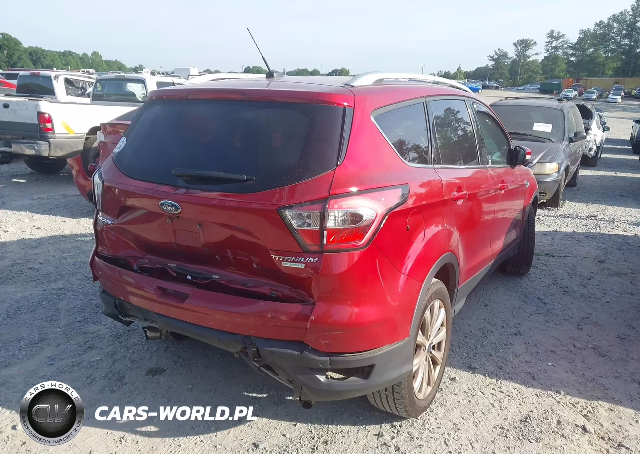 2017 Ford Escape Titanium VIN:1FMCU0J98HUD24828 - 4