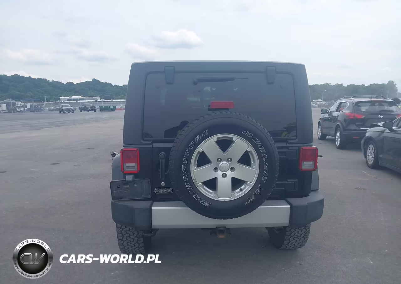 2011 Jeep Wrangler Unlimited Sahara VIN:1J4BA5H15BL559782 - 13