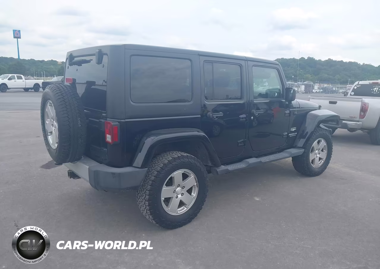2011 Jeep Wrangler Unlimited Sahara VIN:1J4BA5H15BL559782 - 4