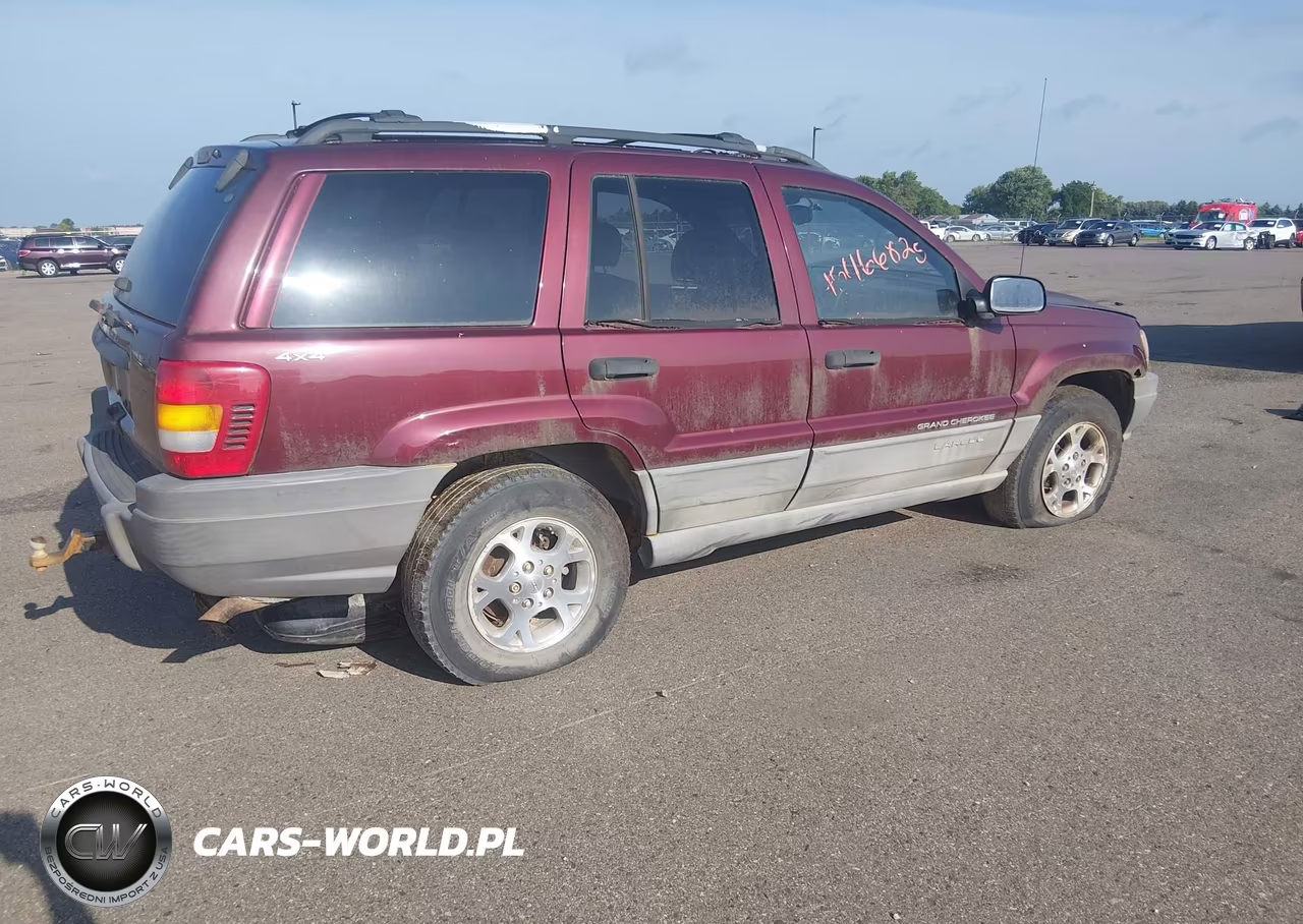 1999 Jeep Grand Cherokee Laredo VIN:1J4GW58S0XC606711 - 4