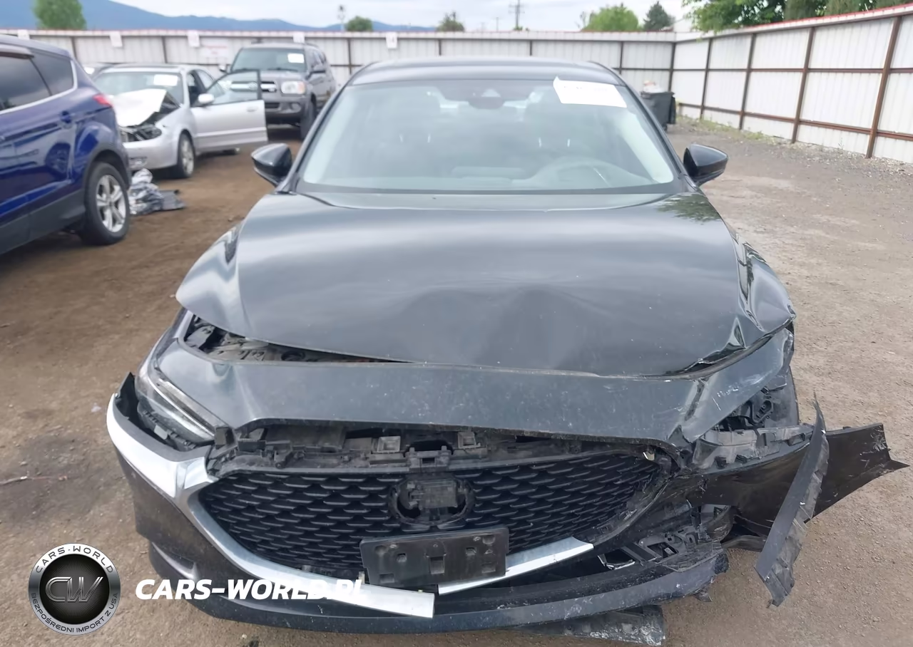2022 Mazda Mazda3 Premium VIN:3MZBPBDL7NM300298 - 12