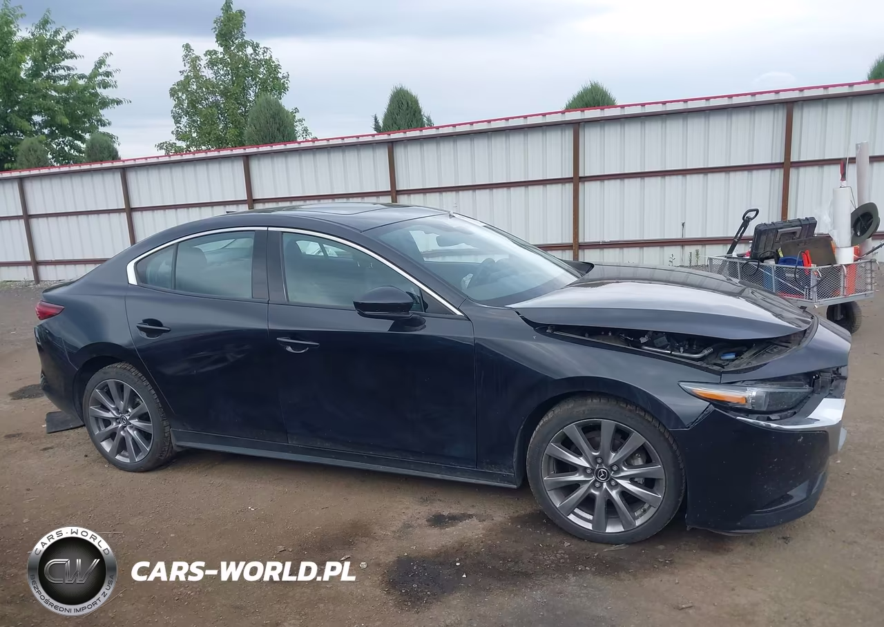 2022 Mazda Mazda3 Premium VIN:3MZBPBDL7NM300298 - 13