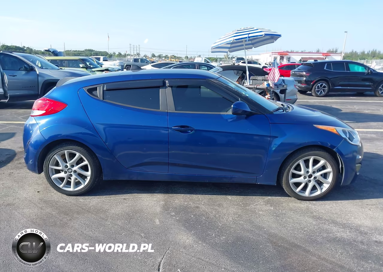2017 Hyundai Veloster VIN:KMHTC6AD6HU305706 - 13
